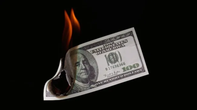 burning dollar bill